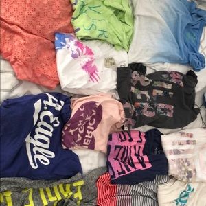 A lot of American eagle t-shirts and long sleeves